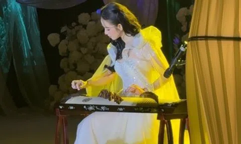 Người mẫu Hương Liên chơi đàn, được chồng CEO hơn 12 tuổi bế bổng trong đám cưới