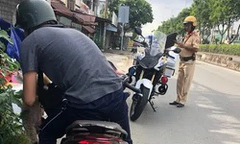 Nhiều người điều khiển xe máy ở TPHCM bị xử phạt do ngại đi đường vòng