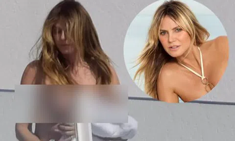 Siêu mẫu Heidi Klum gây tranh cãi khi bán nude tắm nắng ở ban công
